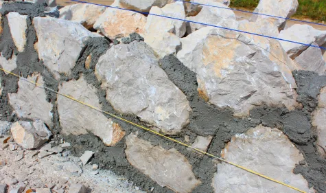 DESETKA GRADBENIŠTVO HAZIR KALAČ S.P., Polaganje kamna